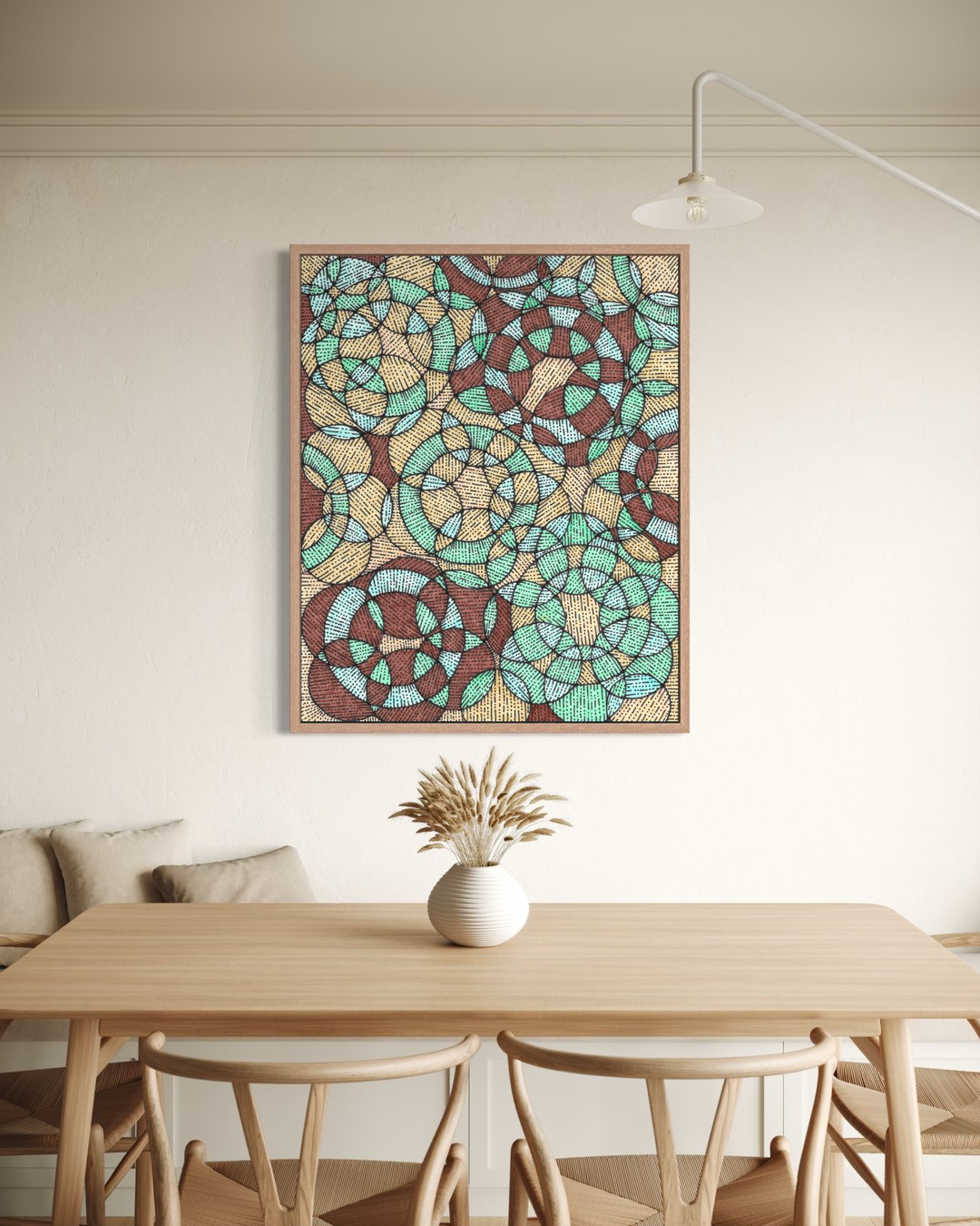 Dia framed above a light wooden dining table