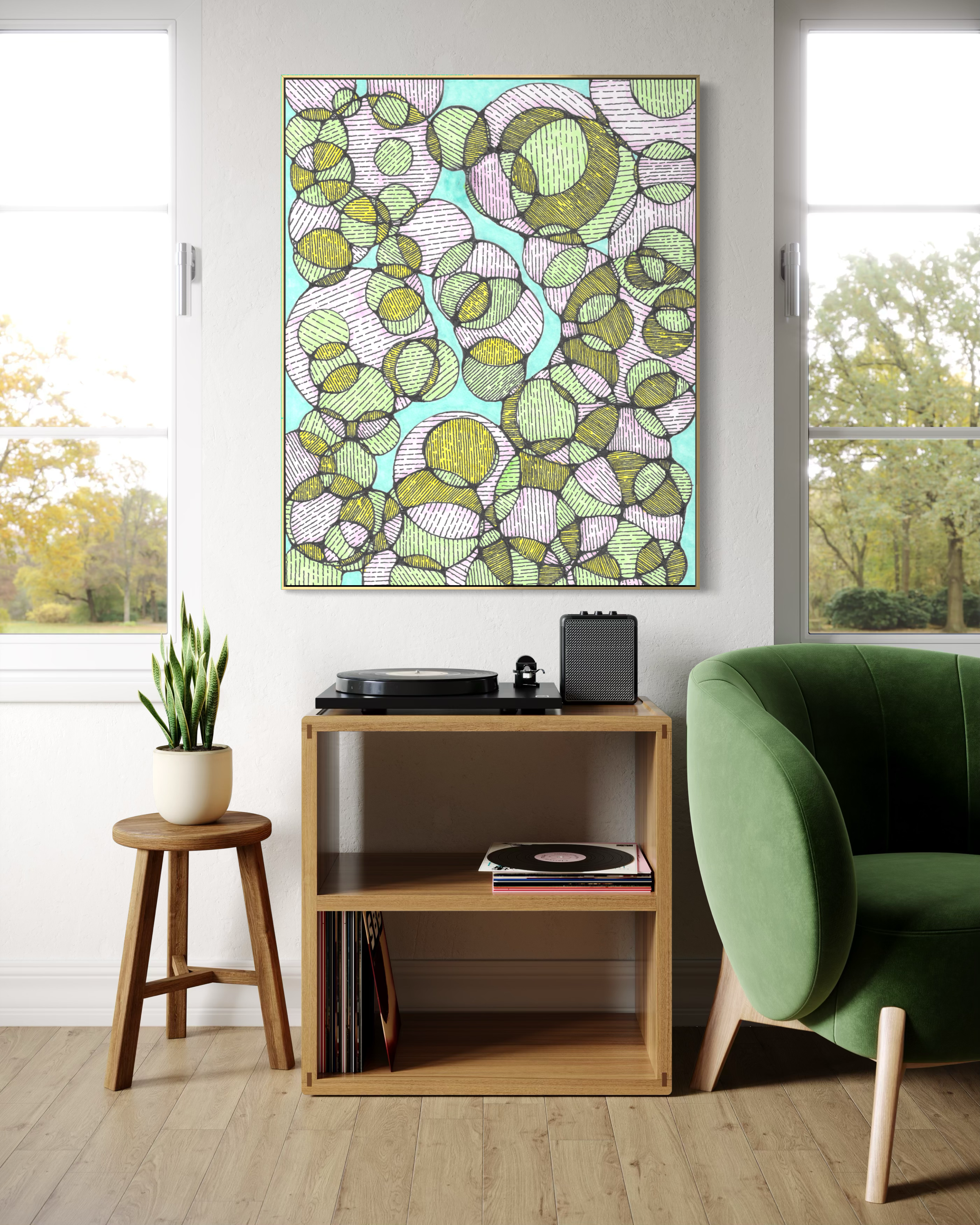 Charis artwork in a listening corner beside a green chair